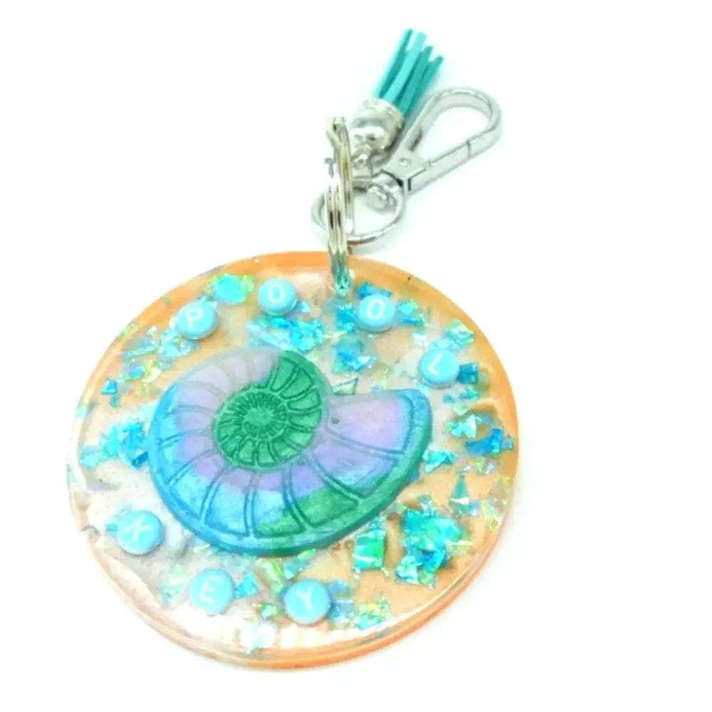 Tropical  Nautilus Shell resin Keychain with teal accents!  POOL KEY Chain
